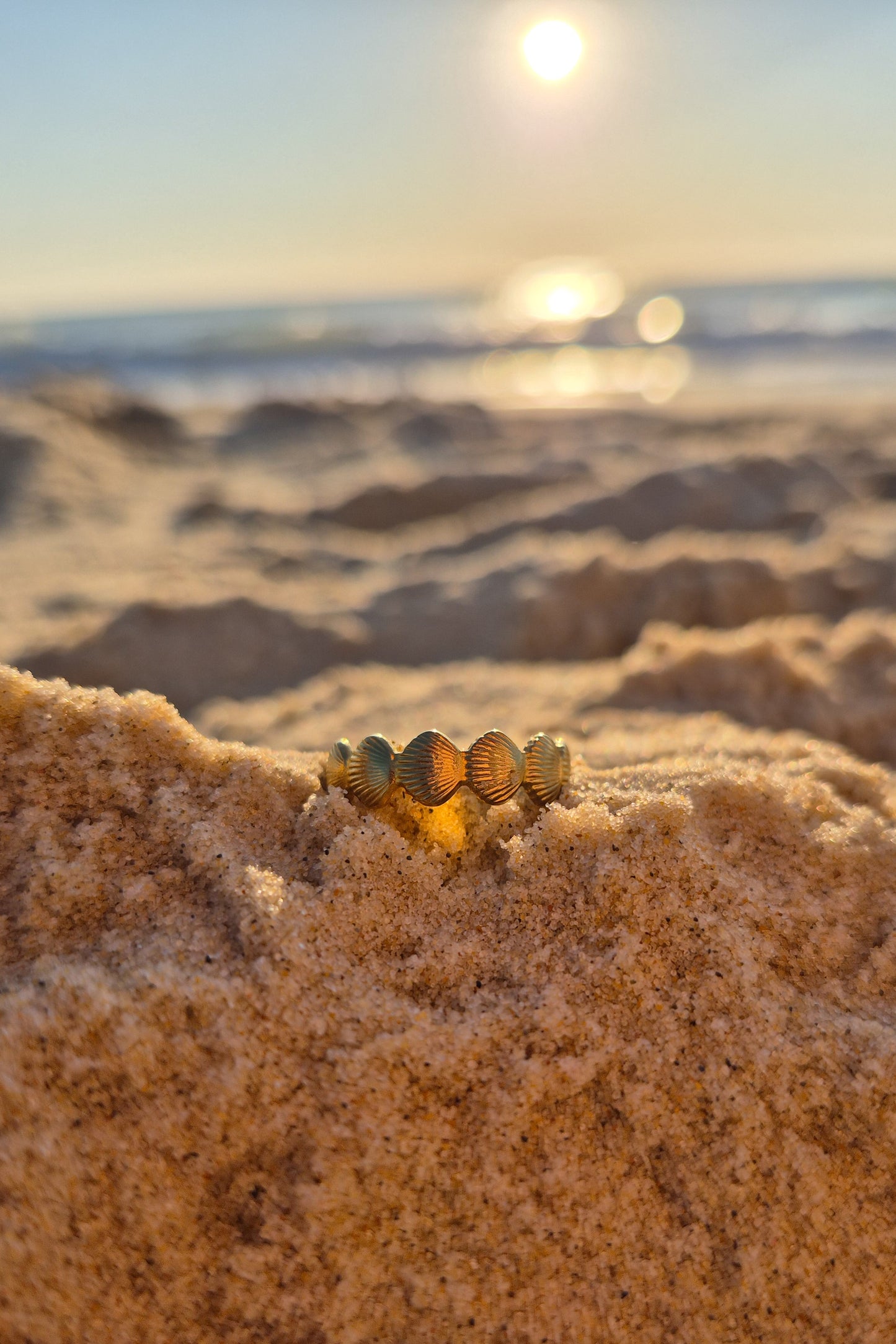 Bague coquillage dorée